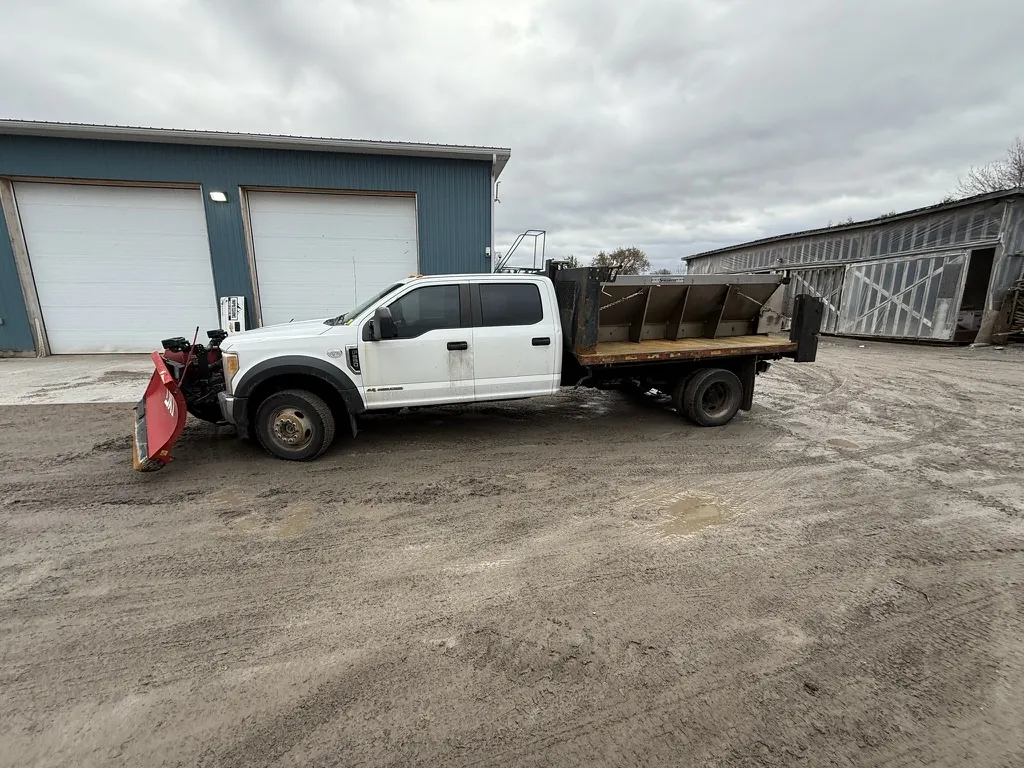Ford F-550 equipped with plow and rear salter