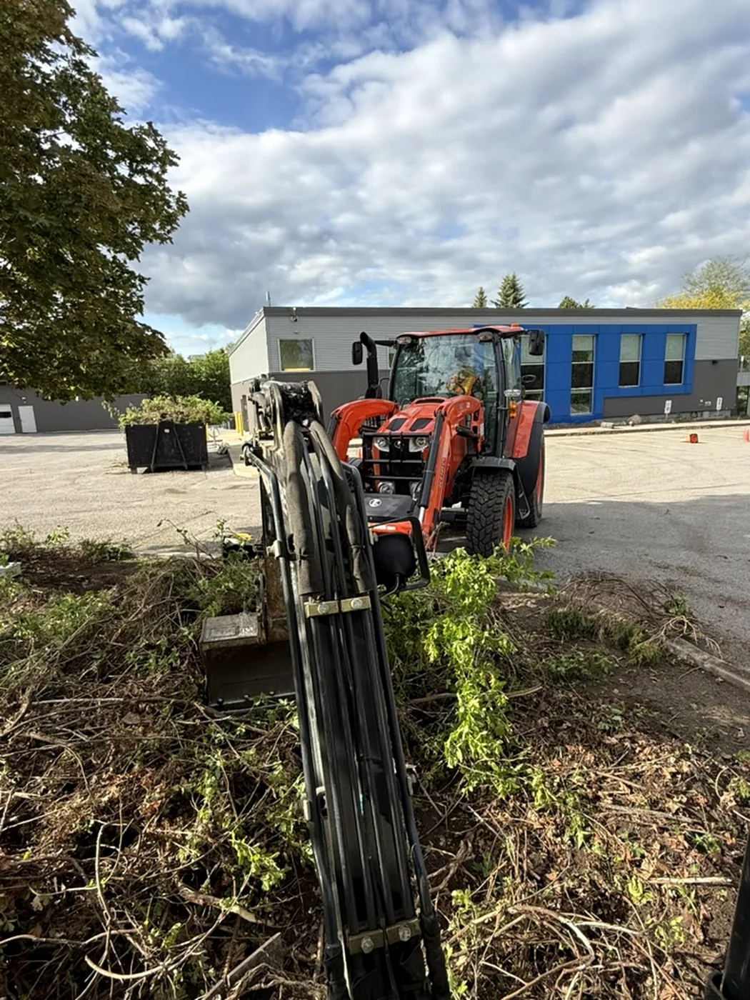 Commercial landscape work in progress using compact equipment