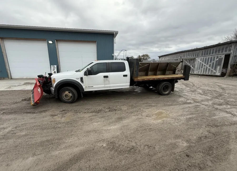 OneBluePlanet commercial snow removal truck with plow and salter in Ottawa